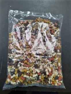 Merkloos Gemengde Partymix-Snoepmix - Minibones - Training Snoepjes - Hondensnoepjes - Traktatie Voor Puppy Van De Snackmeester 1.5kg